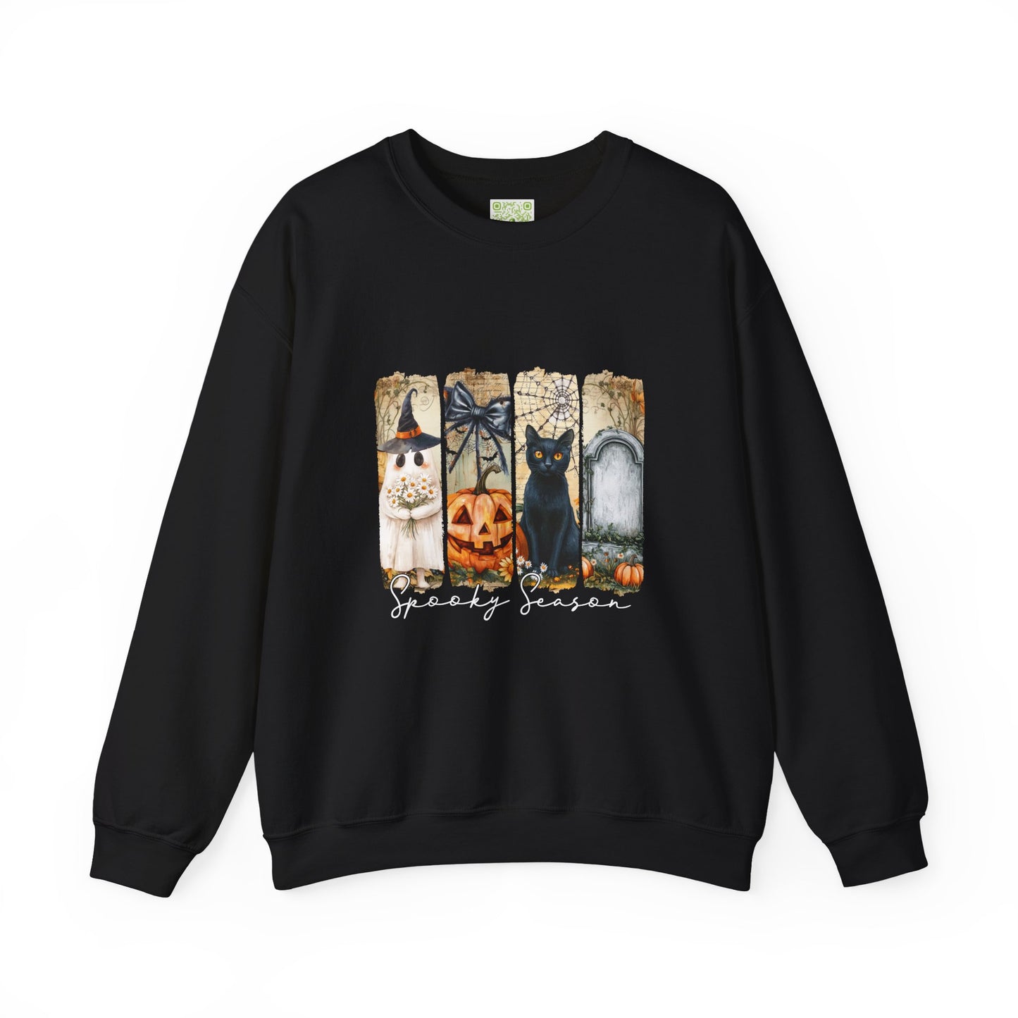 Black sweatshirt with Halloween-themed decor: a witch, pumpkin, black cat, and tombstone for the spooky season.