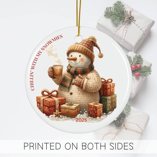 Snowman ornament for Christmas with gifts, cozy sweater, and cocoa, featuring 'Chillin' With My Snowmies' design.